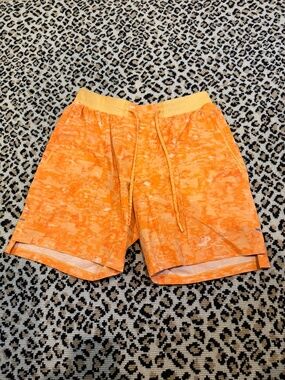 Lululemon License to Train linerless shorts - men’s size Small - orange multi
